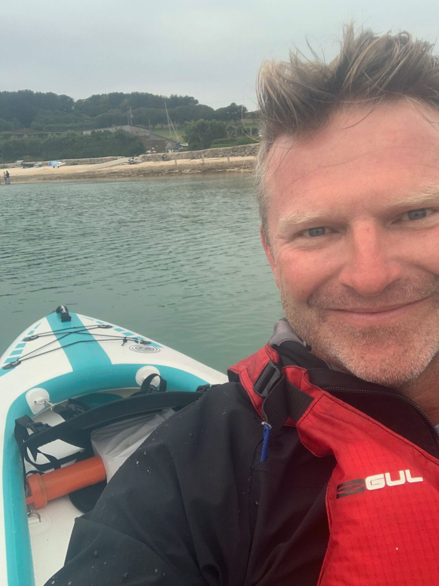 Damian out on the water in a kayak